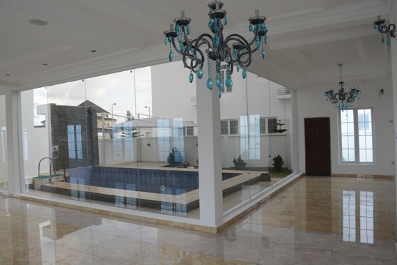 photo-linda ikeji's living room with glass wall - banana island