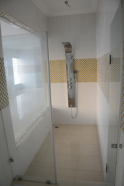 photo-linda ikeji's shower room - banana island